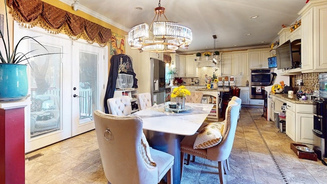 dining space featuring french doors, recessed lighting, visible vents, and crown molding