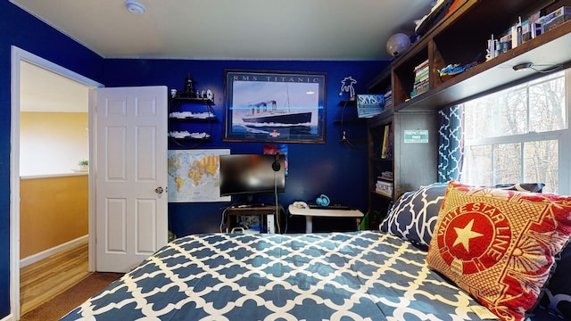 bedroom featuring baseboards