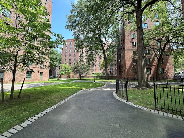 view of home's community featuring a yard