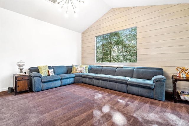 carpeted living room featuring an inviting chandelier, wooden walls, and vaulted ceiling