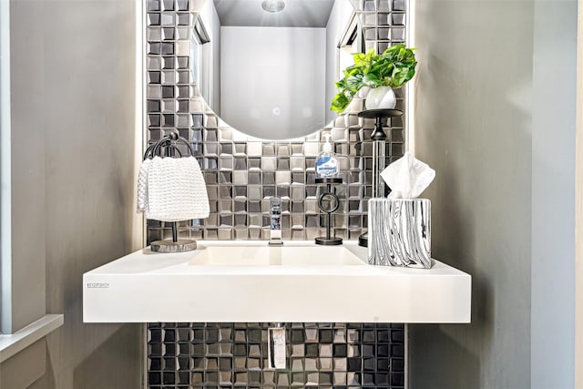 bathroom featuring decorative backsplash