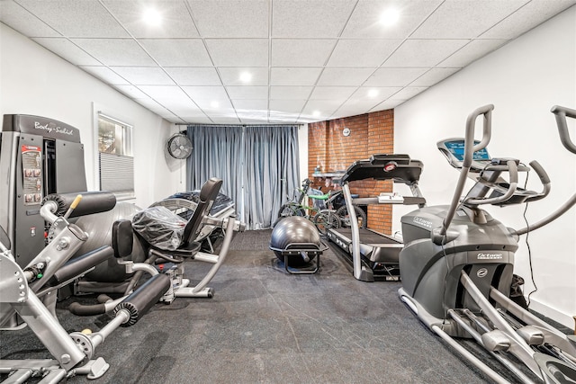 gym with a drop ceiling