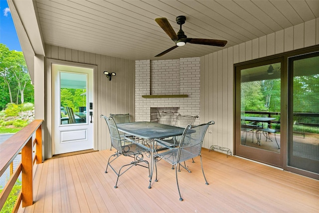 sunroom / solarium with ceiling fan