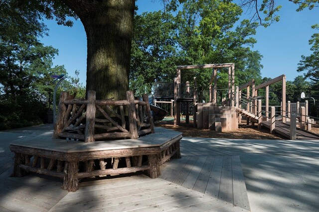 5900 Arlington Ave Unit 18L, Bronx, NY 10471 - wooden terrace with a playground