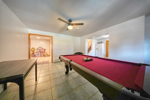 recreation room featuring ceiling fan, pool table, and a baseboard heating unit