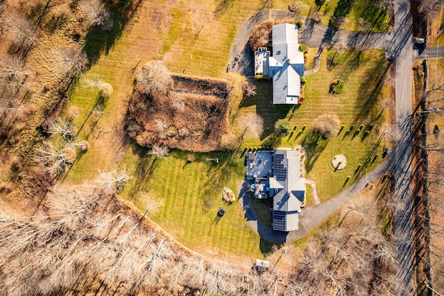 birds eye view of property with a rural view