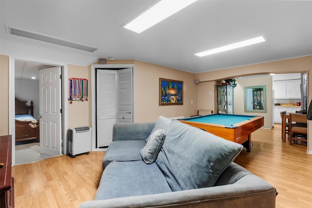 game room with light hardwood / wood-style flooring and billiards