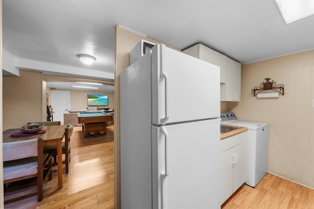 clothes washing area with billiards and light hardwood / wood-style flooring