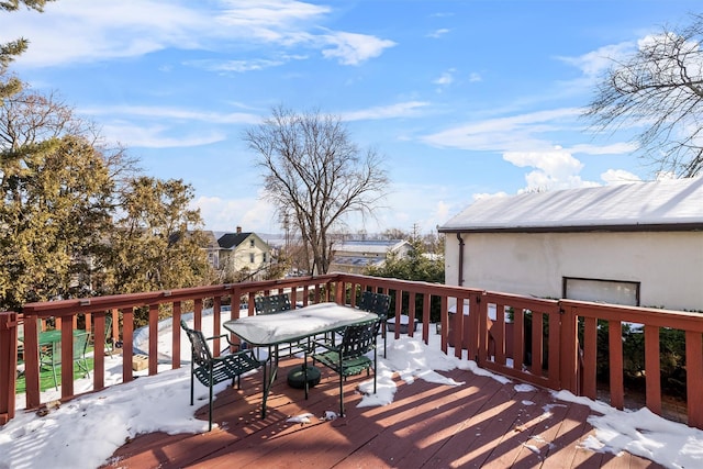 view of snow covered deck