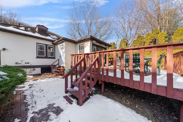 view of snow covered deck