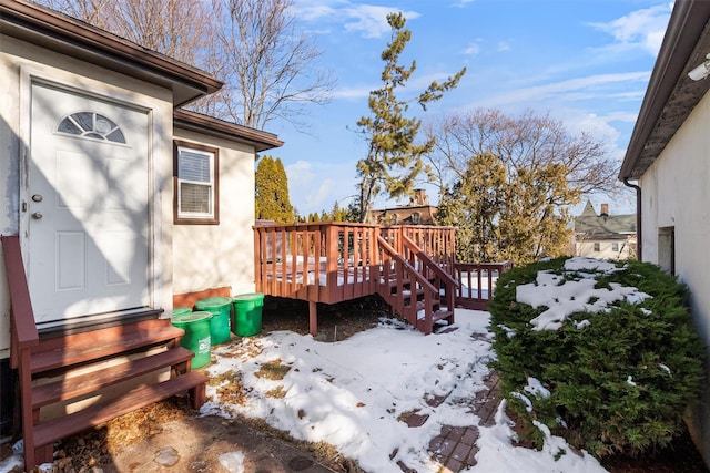 view of snow covered deck