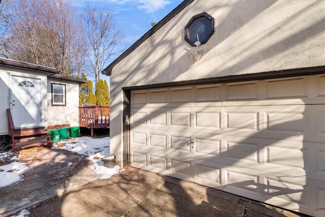 view of snow covered garage