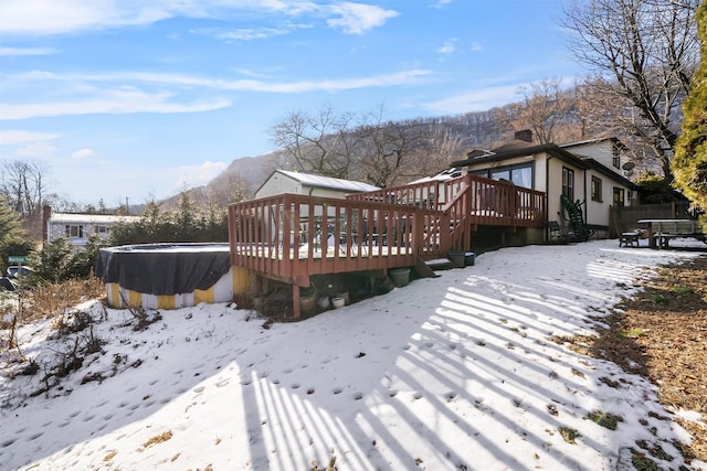 exterior space with a swimming pool side deck