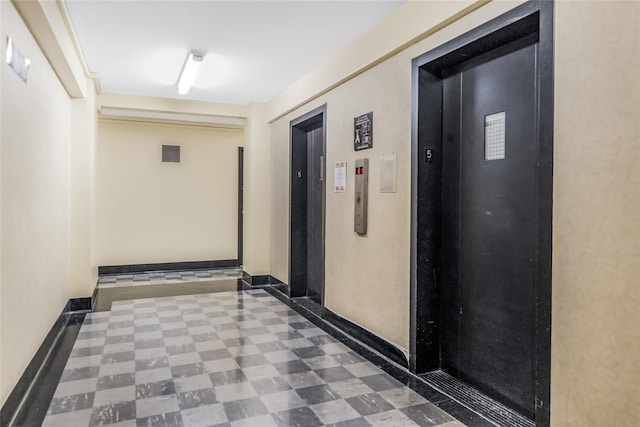 hallway featuring elevator