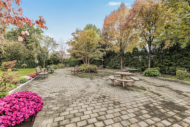 view of property's community with a patio