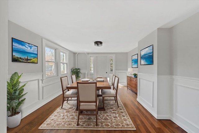 dining room with dark hardwood / wood-style floors