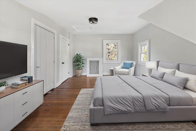 bedroom featuring dark hardwood / wood-style floors