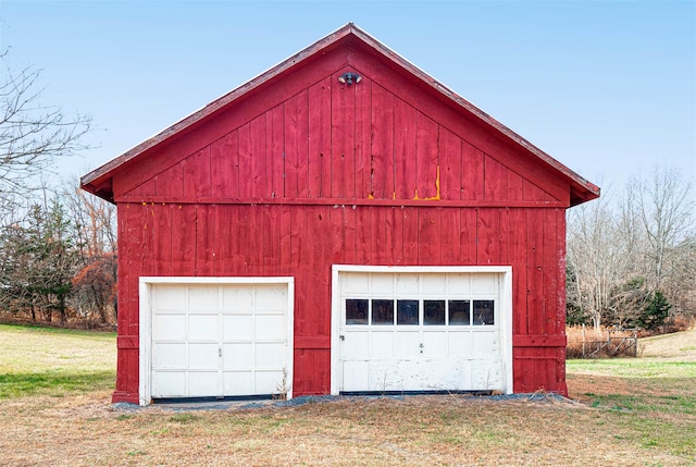 garage with a yard