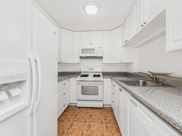 kitchen with white cabinetry, sink, backsplash, white appliances, and light tile patterned floors