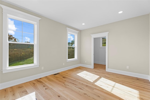 empty room featuring light hardwood / wood-style floors