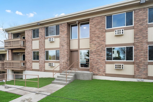 view of property featuring a wall unit AC