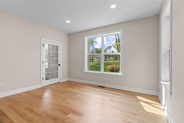 empty room featuring light hardwood / wood-style floors