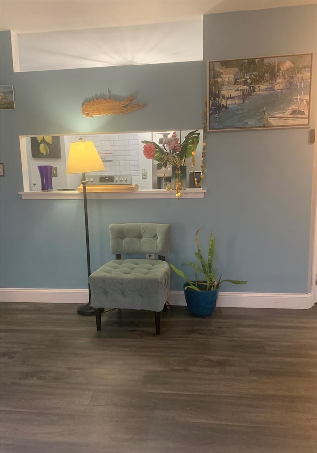 615 Broadway Unit 81, Amityville, NY 11701 - living area with wood finished floors and baseboards