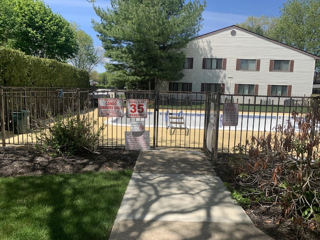 615 Broadway Unit 81, Amityville, NY 11701 - view of front facade with a gate