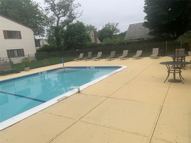615 Broadway Unit 81, Amityville, NY 11701 - community pool featuring a patio area