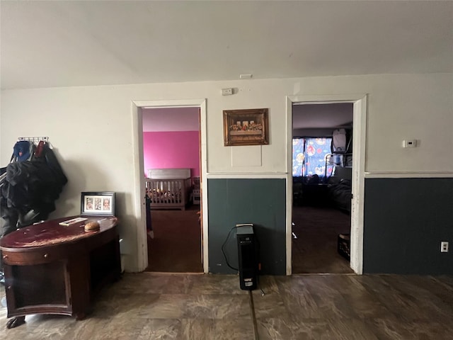 interior space with dark hardwood / wood-style flooring