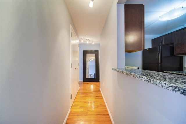 hall featuring light hardwood / wood-style flooring