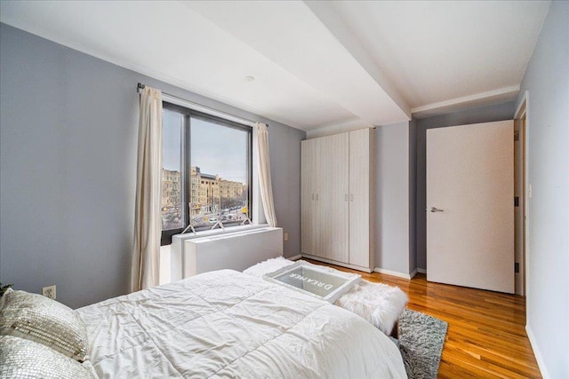 bedroom featuring hardwood / wood-style flooring