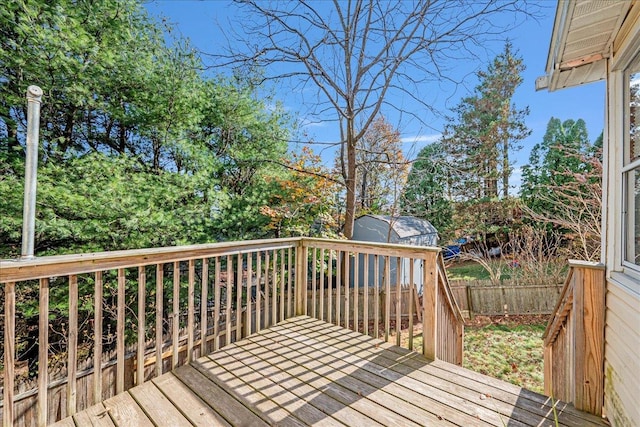 deck featuring a shed