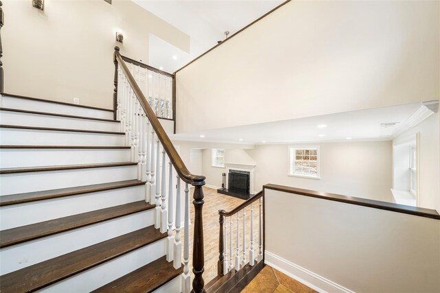 staircase featuring hardwood / wood-style floors
