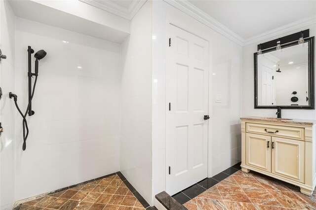 bathroom featuring vanity and ornamental molding
