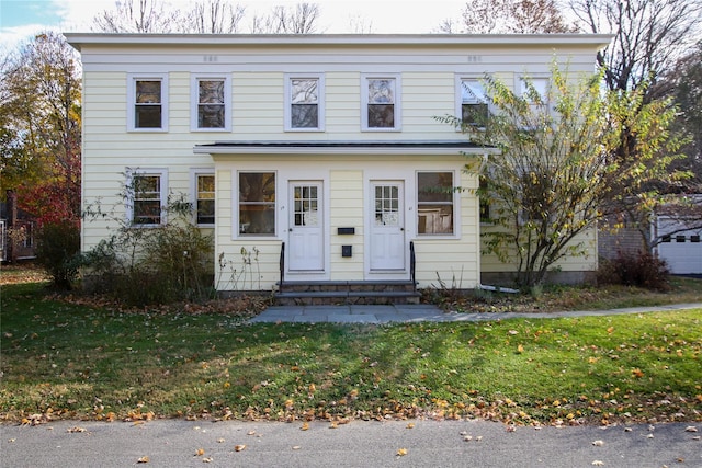 view of front of home with a front yard