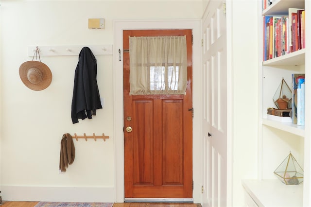 mudroom with hardwood / wood-style floors