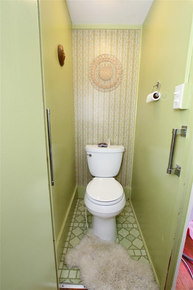 19-21 Moore Ave, Chatham, NY 12037 - bathroom with baseboards, toilet, wallpapered walls, and tile patterned floors