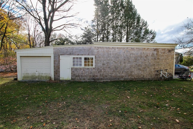 garage with a yard