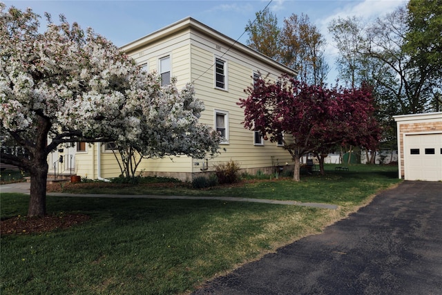 19-21 Moore Ave, Chatham, NY 12037 - view of home's exterior with a garage, a yard, and driveway