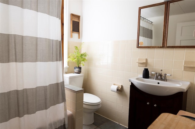 19-21 Moore Ave, Chatham, NY 12037 - full bath with tile walls, toilet, vanity, a shower with shower curtain, and tile patterned floors