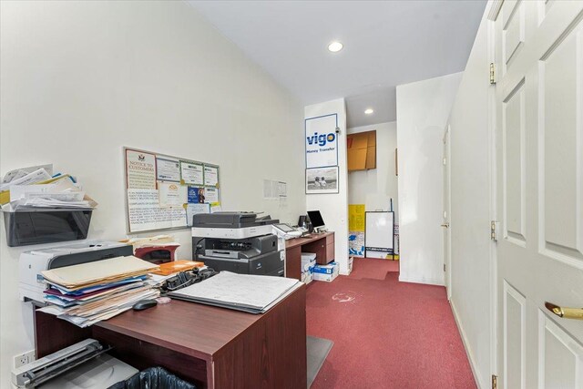 home office featuring dark colored carpet