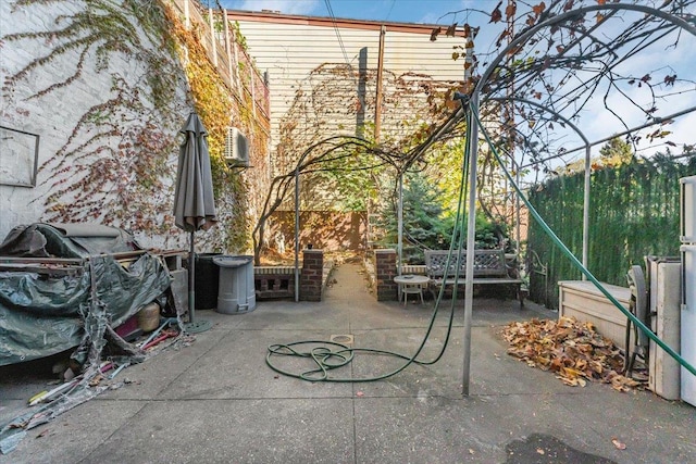 view of patio with a grill