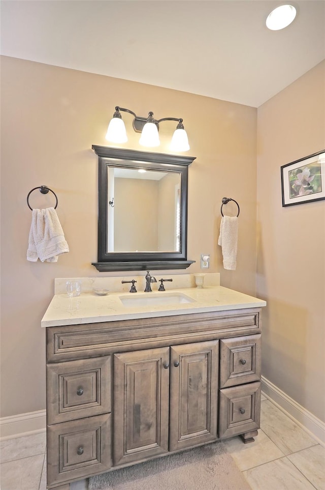 bathroom featuring tile patterned floors and vanity