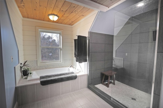 bathroom with separate shower and tub, vaulted ceiling with beams, tile patterned flooring, and wood ceiling