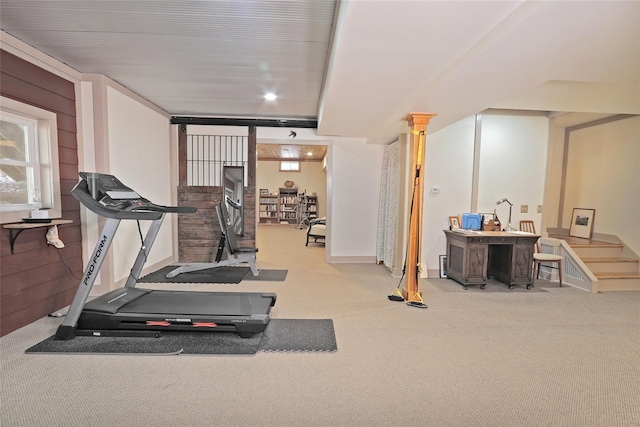 workout room featuring carpet