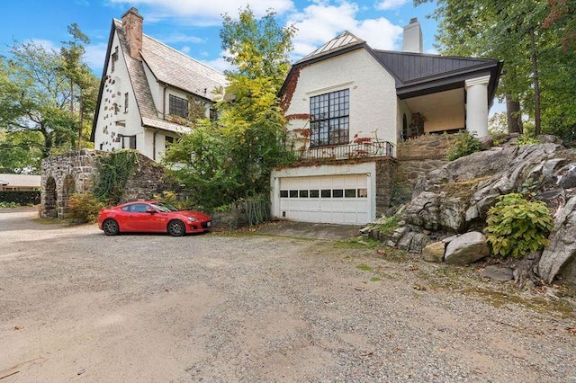 view of front of property featuring a garage