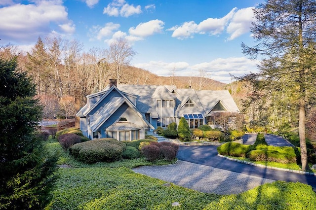 view of front of property with a mountain view