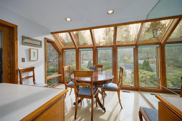 sunroom / solarium featuring a skylight