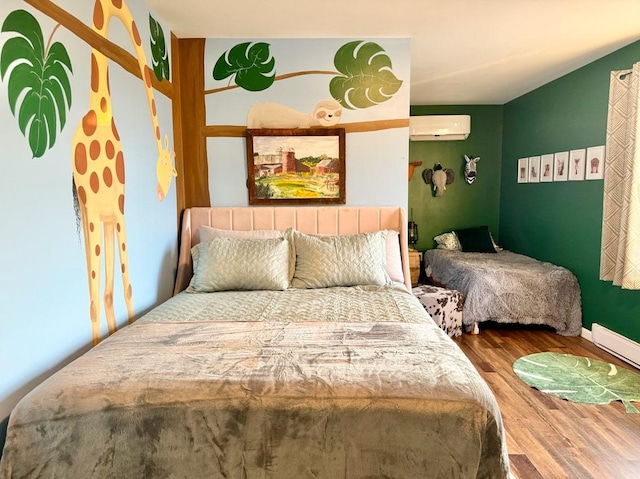 bedroom featuring a wall mounted air conditioner, wood-type flooring, and baseboard heating